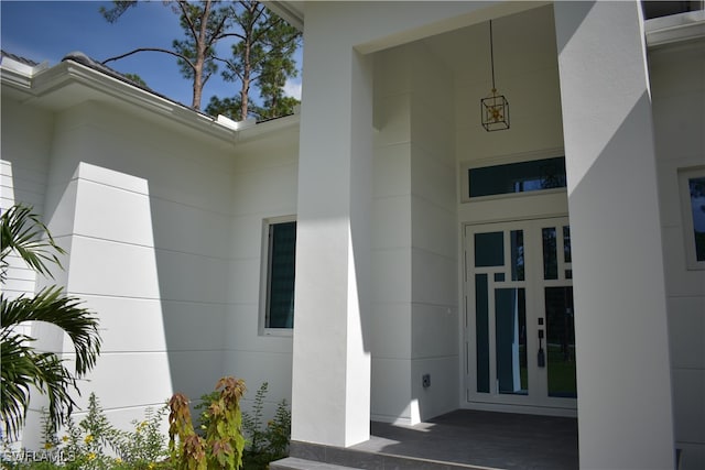 doorway to property featuring french doors