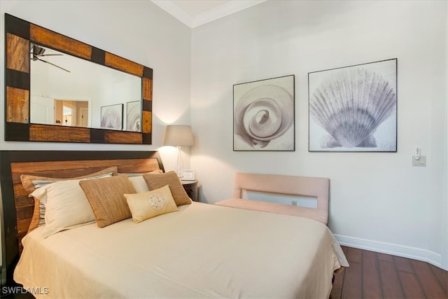 bedroom with wood-type flooring