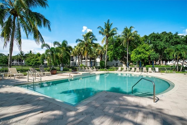 view of swimming pool featuring a patio