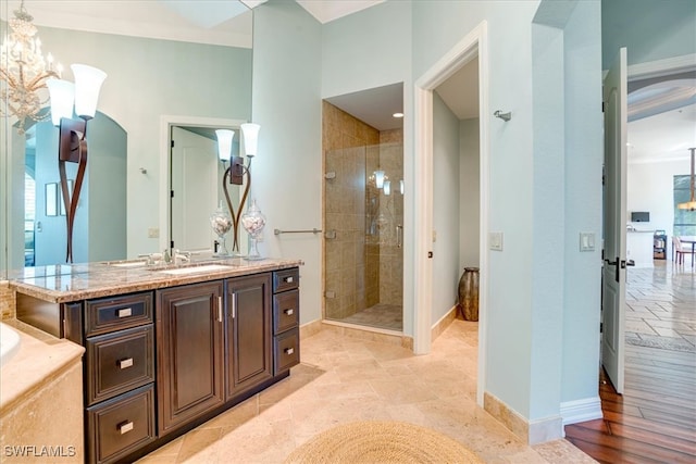 bathroom with crown molding, vanity, tile patterned flooring, and independent shower and bath