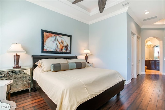 bedroom with ensuite bath, ornamental molding, dark hardwood / wood-style floors, and ceiling fan