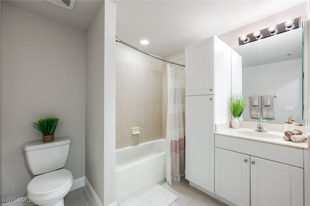 full bathroom featuring shower / bath combo with shower curtain, toilet, tile patterned floors, and vanity