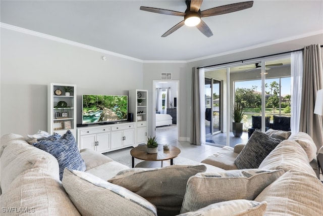 tiled living room featuring ceiling fan and ornamental molding