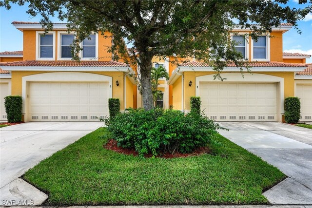 mediterranean / spanish-style house featuring a garage