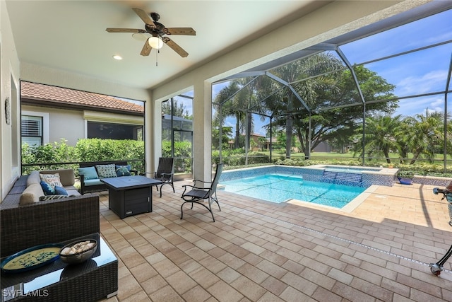 view of pool featuring ceiling fan, an in ground hot tub, a patio area, an outdoor hangout area, and a lanai