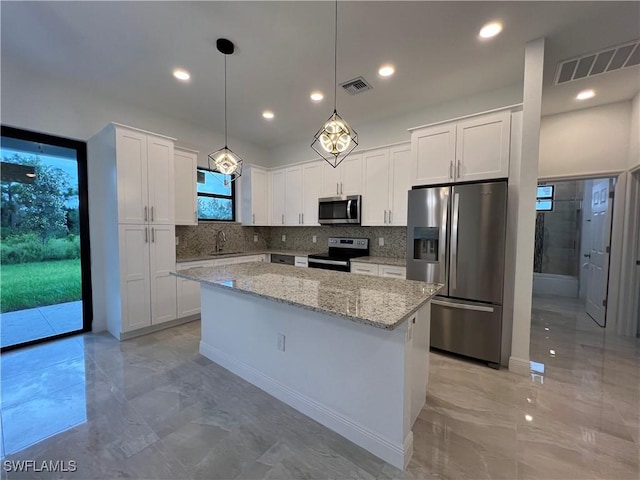 kitchen with visible vents, marble finish floor, and appliances with stainless steel finishes