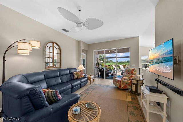 living room with visible vents and a ceiling fan