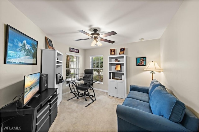 office with light colored carpet and ceiling fan