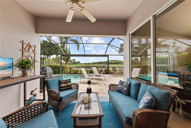 exterior space with plenty of natural light and a ceiling fan