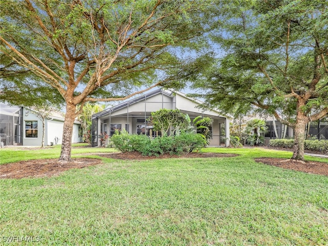 single story home featuring a front yard