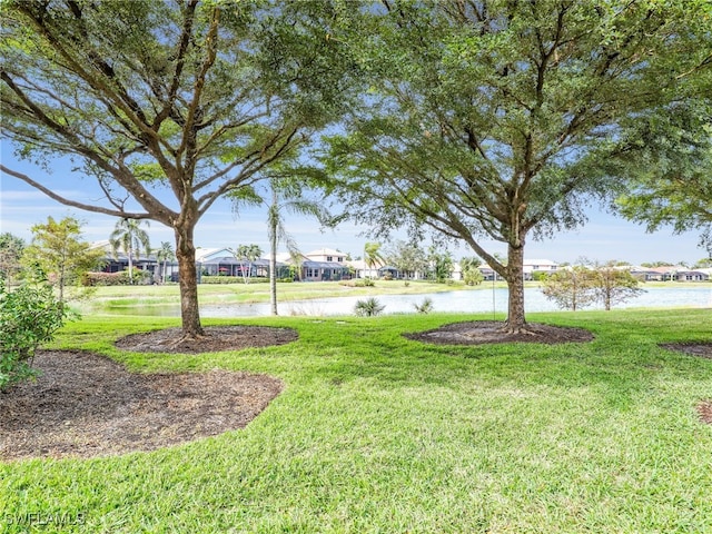 view of yard featuring a water view