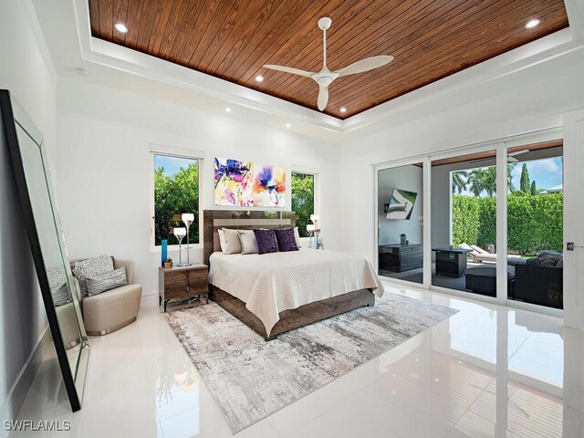 bedroom featuring tile patterned flooring, access to outside, wood ceiling, and a tray ceiling