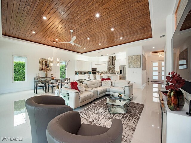 living room featuring ceiling fan, light tile patterned floors, wood ceiling, and french doors