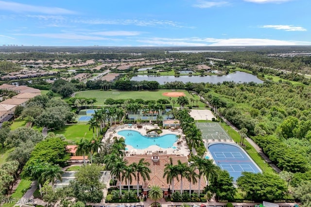 birds eye view of property with a water view