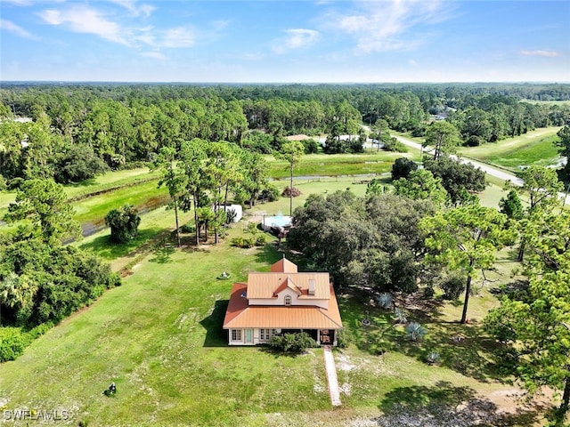 aerial view featuring a forest view