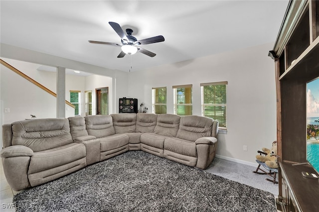 living room featuring ceiling fan and carpet floors