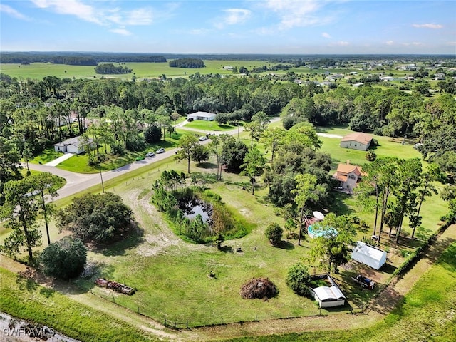 birds eye view of property featuring a rural view