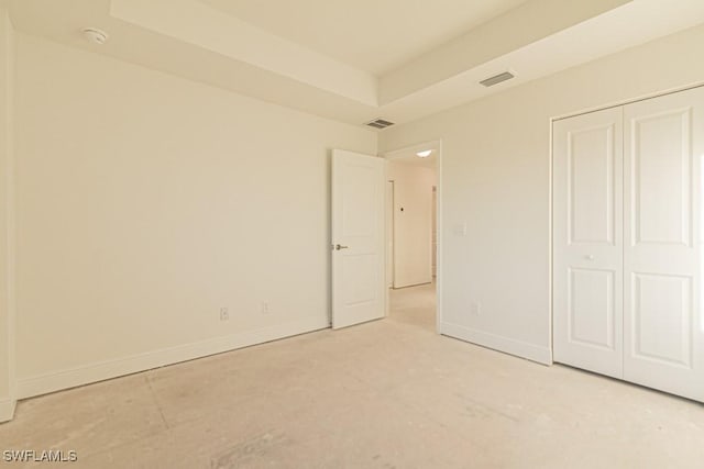 unfurnished bedroom with a closet