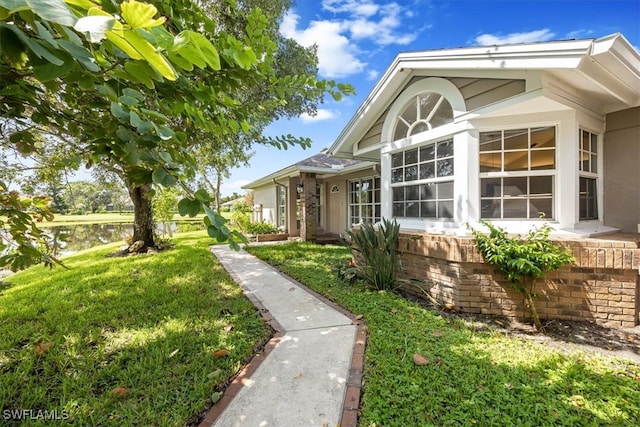 exterior space featuring a lawn