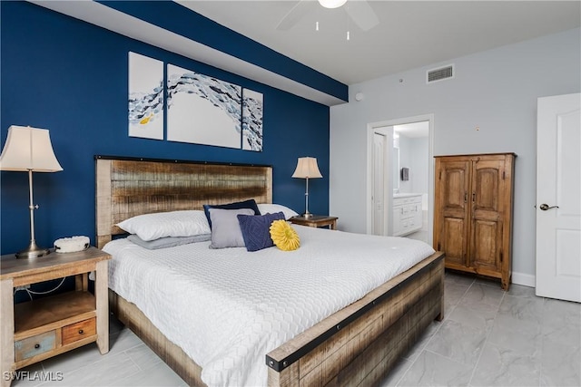 bedroom featuring ceiling fan, visible vents, baseboards, marble finish floor, and ensuite bath