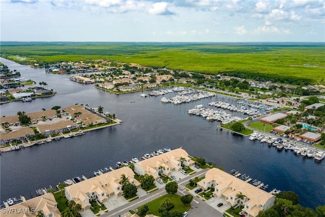 aerial view featuring a water view and a residential view