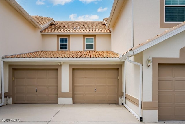 garage featuring driveway