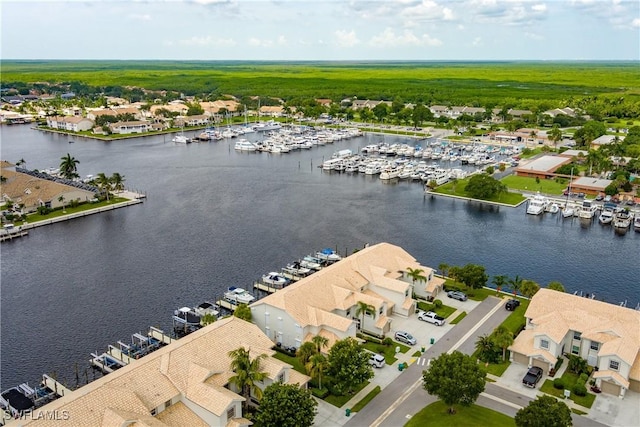 aerial view featuring a water view and a residential view