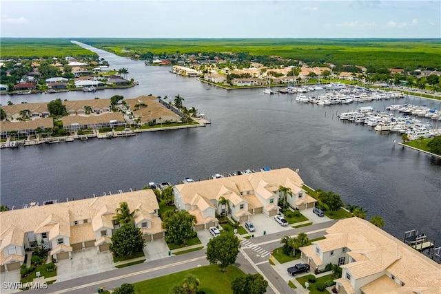 aerial view with a water view and a residential view