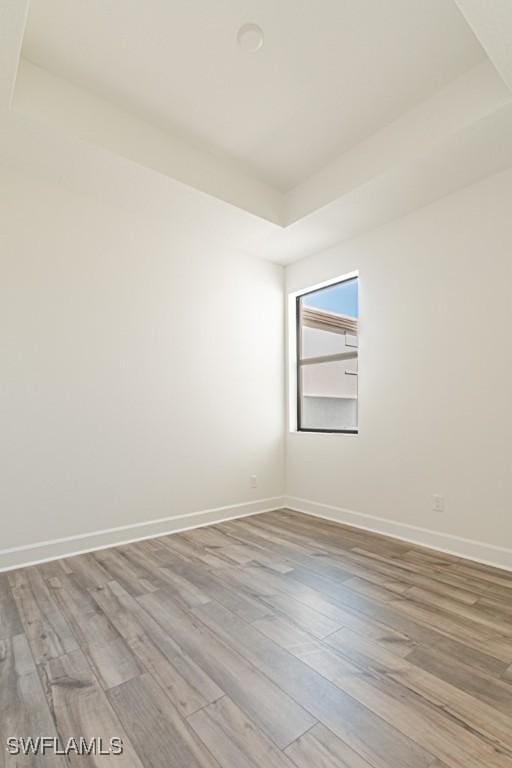 empty room with light wood-type flooring