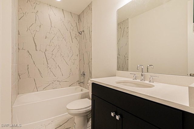 full bathroom with vanity, toilet, and tiled shower / bath