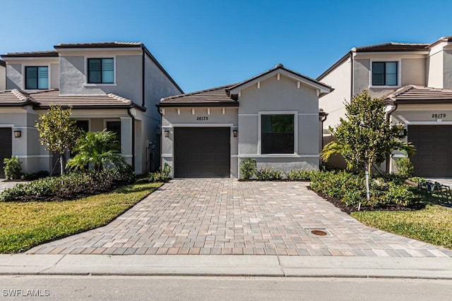 view of front of property with a garage