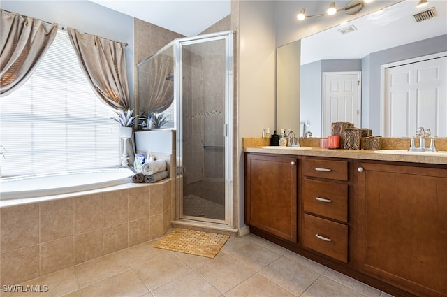 bathroom featuring vanity, tile patterned floors, and independent shower and bath