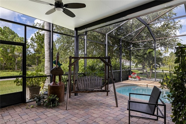 sunroom / solarium with ceiling fan