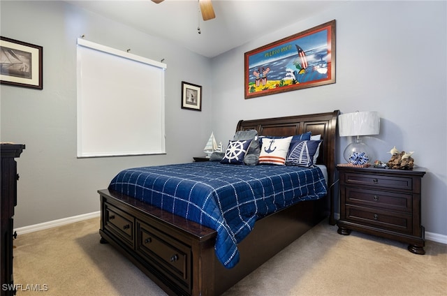 bedroom with light colored carpet and ceiling fan