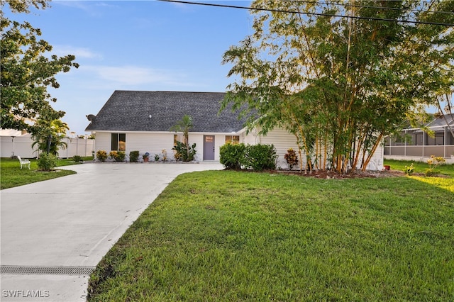 view of front of property with a front lawn