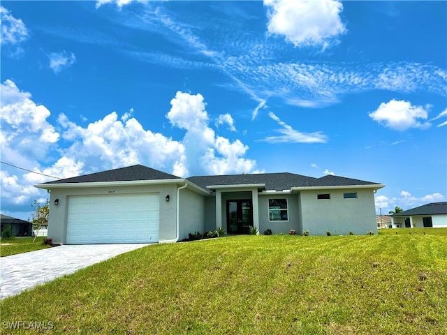 single story home with a garage and a front lawn