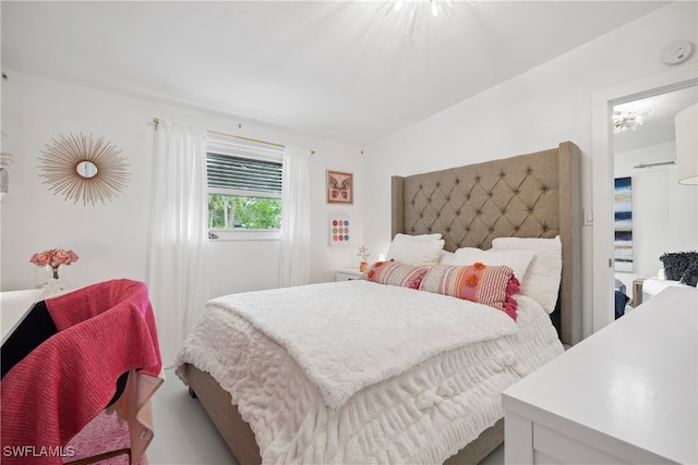 bedroom with lofted ceiling