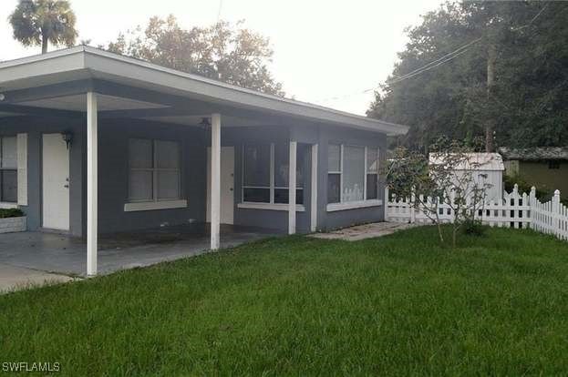 exterior space with a patio and a yard