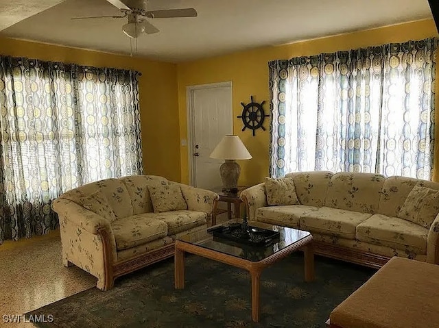 living room featuring ceiling fan