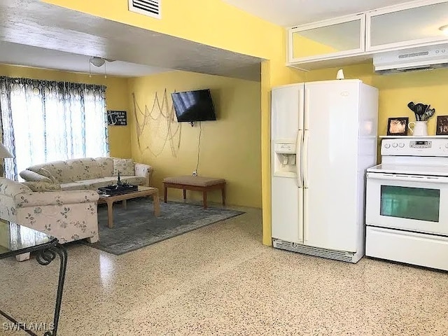 kitchen featuring extractor fan and white appliances