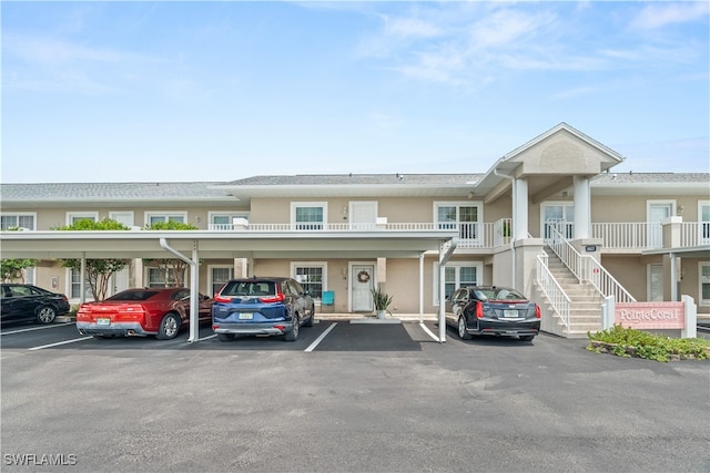 view of parking with a carport