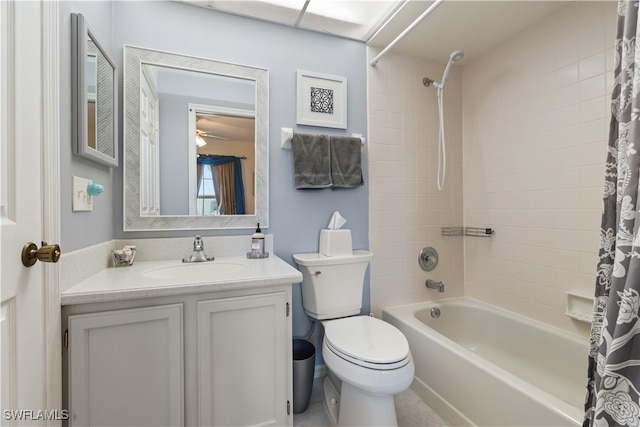 full bathroom with vanity, toilet, and shower / tub combo