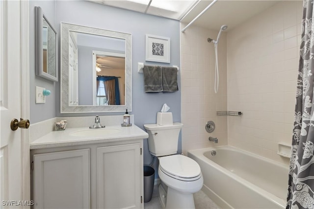 full bathroom featuring vanity, toilet, and shower / bath combo with shower curtain