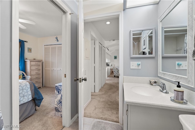 bathroom featuring vanity and ceiling fan