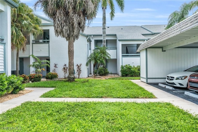 exterior space featuring a front yard