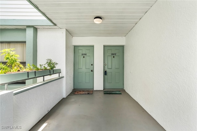 doorway to property with a balcony