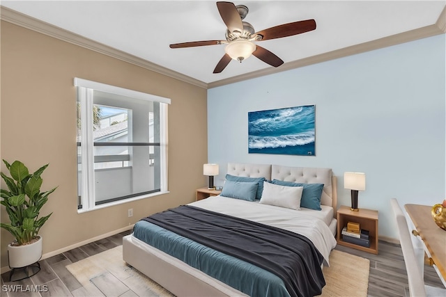 bedroom with crown molding, ceiling fan, and light hardwood / wood-style floors