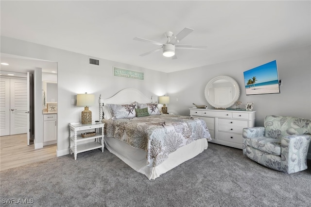 1401 Middle Gulf Dr Unit 301N, Sanibel, FL 33957 - bedroom with carpet floors, ceiling fan, and visible vents