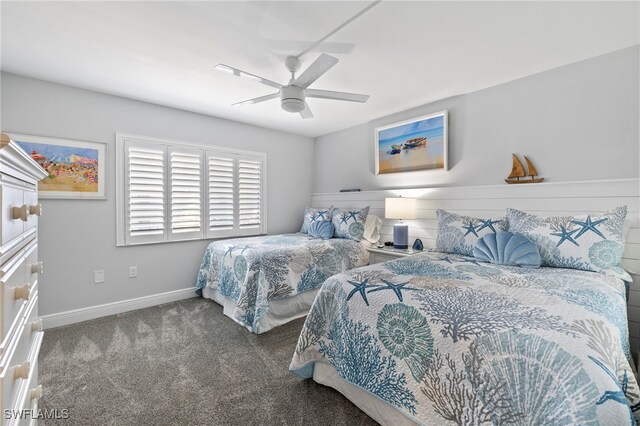 1401 Middle Gulf Dr Unit 301N, Sanibel, FL 33957 - carpeted bedroom featuring baseboards and a ceiling fan