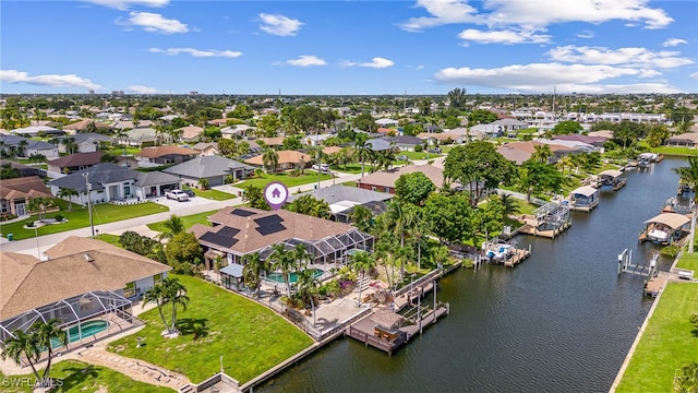 drone / aerial view with a water view